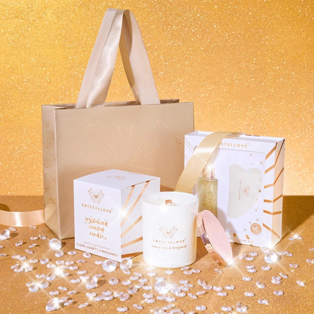 Zestaw prezentowy CRYSTALLOVE z kryształem górskim: serum i płytka gua sha, świeca sojowa oraz elegancka torebka prezentowa