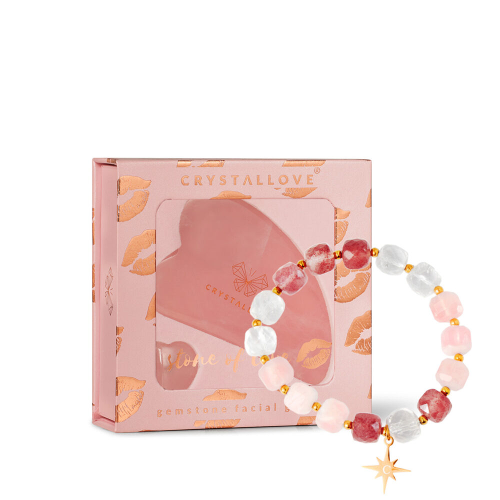 Zestaw prezentowy Crystallove: różowa płytka Gua Sha z kwarcu oraz bransoletka z kamieni naturalnych na eleganckim tle.